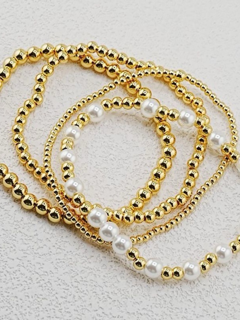 Enewton Gold and White Pearl Stretch Bracelet Set — Elegant 4‑Piece Stack